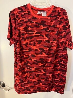 Isaac Morris large red camouflage T-shirt with textured American flag on front.